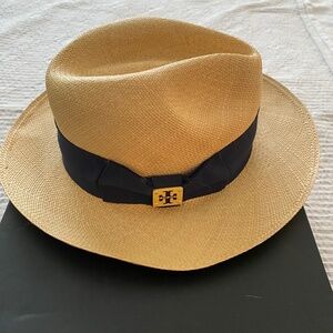 Tory Burch Toquilla Straw Hat with Navy Ribbon and gold emblem